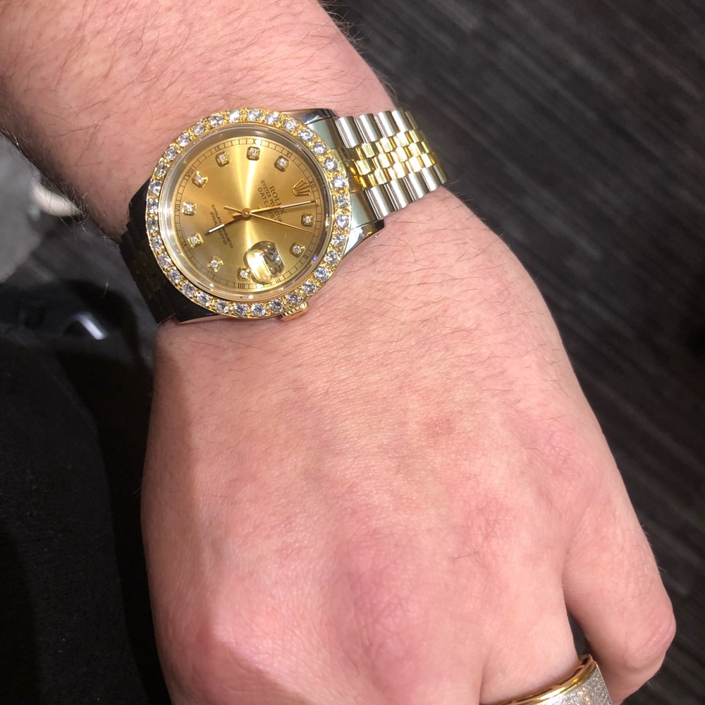 1990’s Rolex datejust with 4 carat bezel